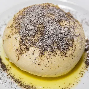 Giant Sweet Dumpling Stuffed with Plum Jam and Vanilla Sauce